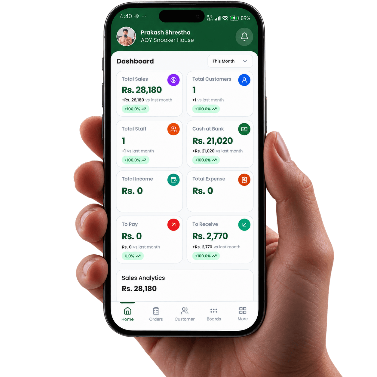 Hand holding a phone with the CuePos dashboard